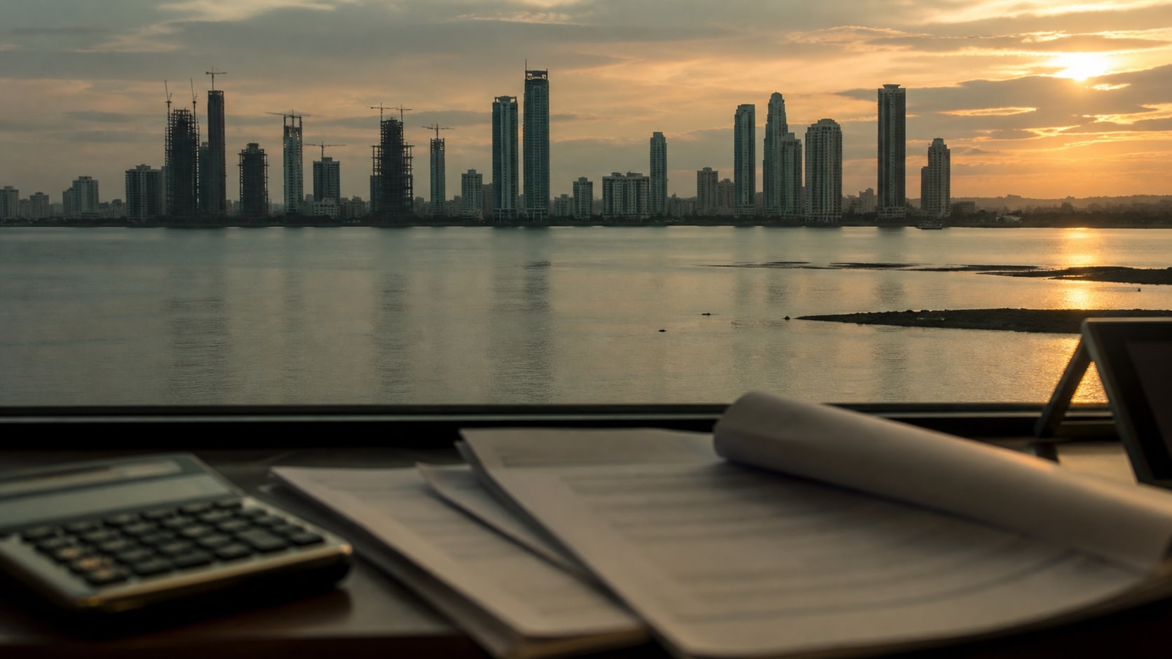 Coastal skyline and documents illustrating a historical market moment